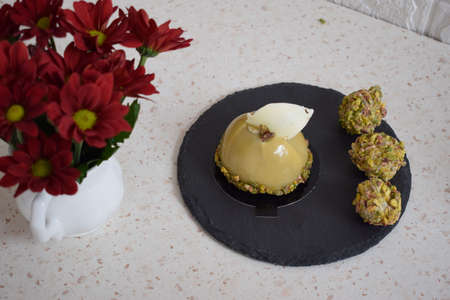 Very tasty cake with chocolate and pistachioの写真素材