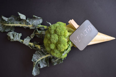 Fresh green broccoli in a wooden coneの写真素材