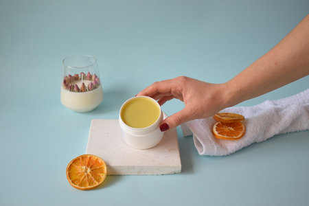 Handmade natural body balm in background pastelの写真素材