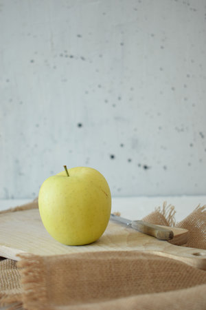 Ripe yellow apple is fresh in the kitchenの写真素材