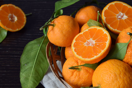 Close up of fresh and tasty tangerines with leavesの写真素材