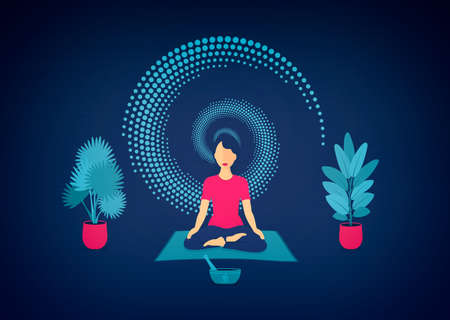 Young Woman Meditating in the Dark - Enlightenment Conceptの写真素材