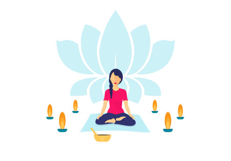 Young Woman Meditating Surrounded by Candles - Meditation Conceptの写真素材