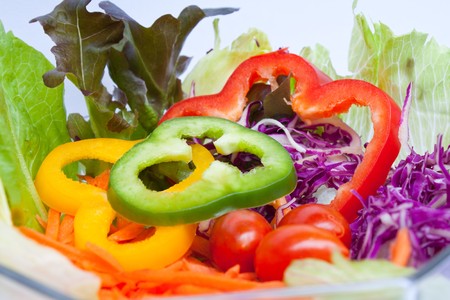 Fresh vegetable healthy salad in glass bowlの写真素材