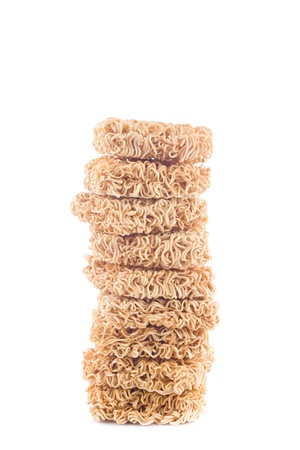Stack of raw instant noodle on white backgroundの写真素材