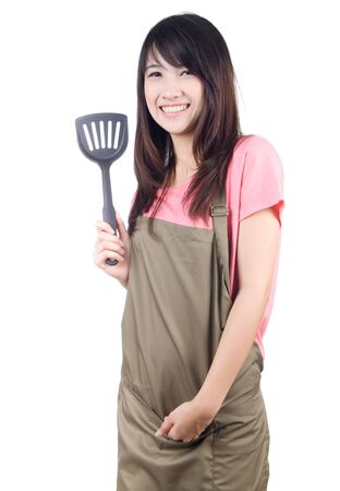 Young asian woman housewife on white backgroundの写真素材