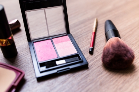 Cosmetics set  on wood floor
