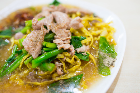 Fried noodle with pork, in gravy, Chinese and Thai Style Noodle.の写真素材
