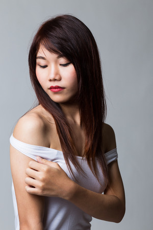 Beautiful sexy asian girl wearing white shirtの写真素材