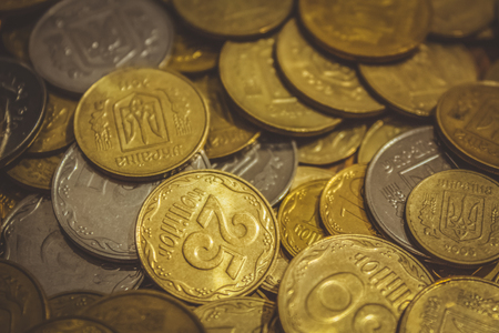 Background with ukrainian coins with frame for space for copy or textの写真素材