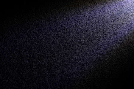 dark stylish textured surface with projector light and shadow frame wallpaper background concept mock up pattern for commerce advertising picture with empty copy space for your text hereの写真素材