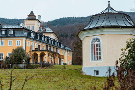 central European country side catholic monastery capel and living building yard in rainy weather autumn seasonの写真素材