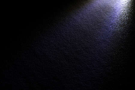 dark textured surface with ray of light simple stylish background wallpaper pattern empty copy space for your textの写真素材
