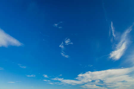 blue sky white clouds background wallpaper pattern empty copy spaceの写真素材