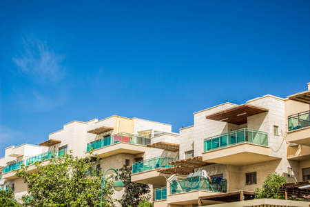 small cottages living apartment in south architecture style in summer bright clear weather time and clean blue skyの写真素材