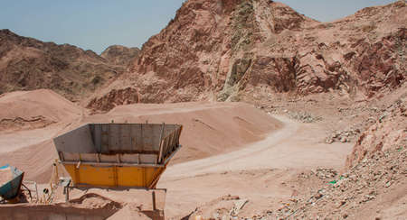 abandoned machinery equipment steel factory container in human hand made desert quarry objectの写真素材