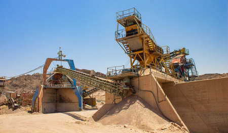 cranes and other industrial equipment of not working Arabic digging factory in Middle Eastの写真素材