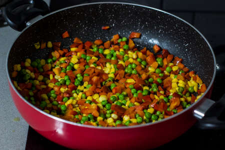 vegetarian stew cooking process in pan food photography background viewの写真素材