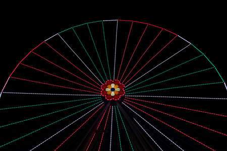 carnival Ferris wheel carousel entertainment object holidays festive time circle shape construction...