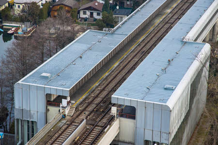 transportation infrastructure subway station railroad tracks diagonal line from above urban landmark