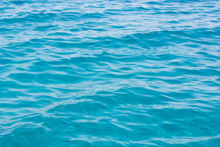 blue water sea background wallpaper pattern surface copy space for textの写真素材