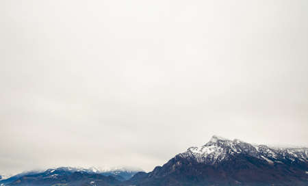 panoramic Alps mountain ridge snowy peak nature scenery landscape wallpaper background scenic view with empty copy space for your text, winter timeの写真素材