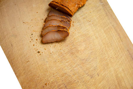 raw smoked meat Basturma Armenian traditional dish food photography background wooden board for cut textured surface and white symmetry frame work empty copy space for your textの写真素材