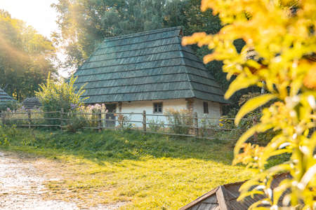 Ukraine village rural house garden park outdoor nature space morning sun rise time with glare rays of yellow lightの写真素材