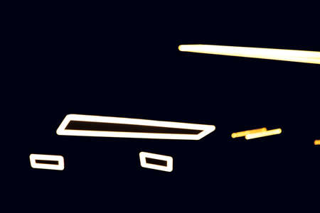 electricity lamp white illumination frame shape on roof black background space inside environment viewの写真素材