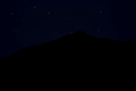dark night sky landscape abstract photography of black mountain silhouette shape on star sky background space scenic view wallpaper patternの写真素材