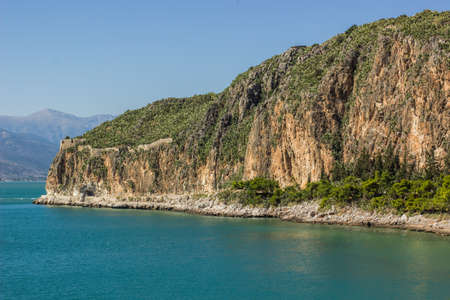 Mountain rock cape on sea lagoon tropic Mediterranean scenic landscape copy space for textの写真素材