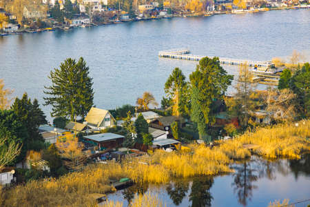 rustic Asian jetty waterfront country side nature environment top view scenery landscape of houses and dock on river in spring time peaceful morning timeの写真素材