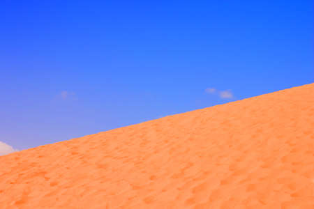 desert sand dune horizon background diagonal line with empty blue sky background minimalism landscape outdoor scenic view concept nature picture with copy space for your text hereの写真素材