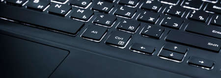 laptop keyboard light bottoms alt and ctrl center of composition technology computer background...