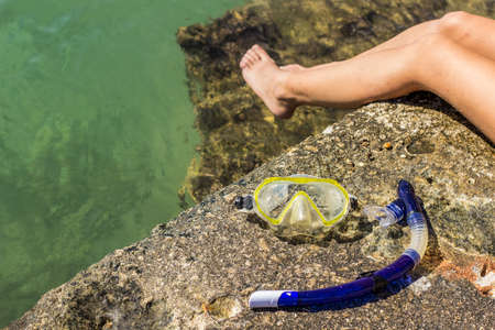 vacation active lifestyle concept of snorkeling mask equipment object on stone south beach with...
