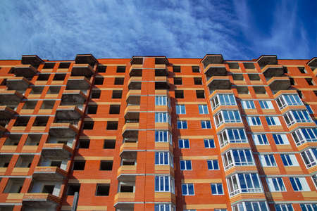 unfinished huge brick building exterior facade vintage architecture style construction process urban...