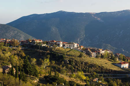 inhabited locality village in highland country side district between mountain landscape environment...