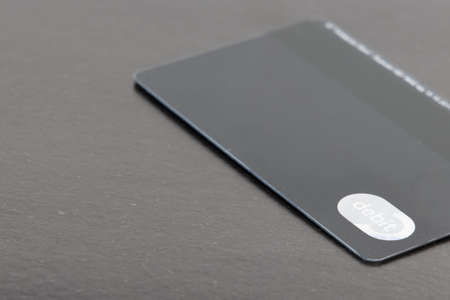 credit card debit finance business concept object poster with neutral dark stylish background...