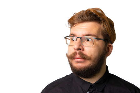surprised male expression portrait face with beard mustache and glasses looking side ways on white...