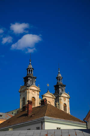 christian church towers cathedral building vertical photography with blue sky background empty copy spaceの写真素材