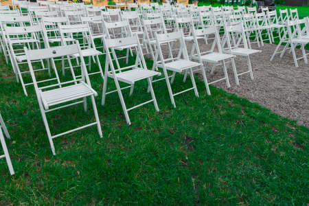rows of white chairs photography outdoor space preparing for performance, no peopleの写真素材