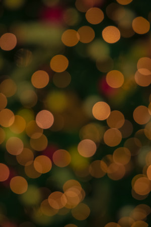 unfocused bokeh lights from garland lamps concept abstract vertical photography
