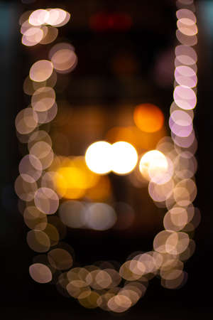 vertical picture abstraction Christmas bokeh illumination unfocused viewの写真素材