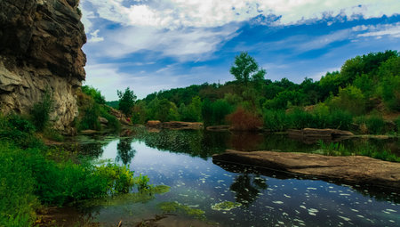 river stream and picturesque stones and rocks landscape environment natural view of spring time...