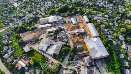 old decayed abandoned factory Eastern Europe from USSR times in center of living district near people houses, aerial photography top viewの写真素材