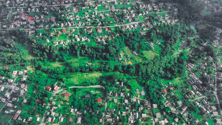 aerial Ukrainian village country side green environment space of living district with houses and cottages buildingsの写真素材