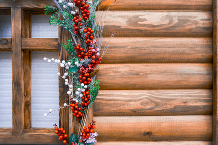 rural decorative house wooden facade of Christmas festive interior elements guelder rose rustic simple objects with empty copy space for winter holidays advertising textの写真素材