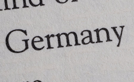 Germany word in paper book white texture text element string close up macro photoの写真素材