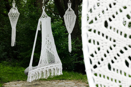 hanging chair decorative comfortable element in garden outdoor environment space spring warm time...