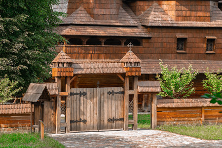 wooden church huge entrance gate country side Ukrainian landmark religion building facade traditional architecture medieval exterior viewの写真素材